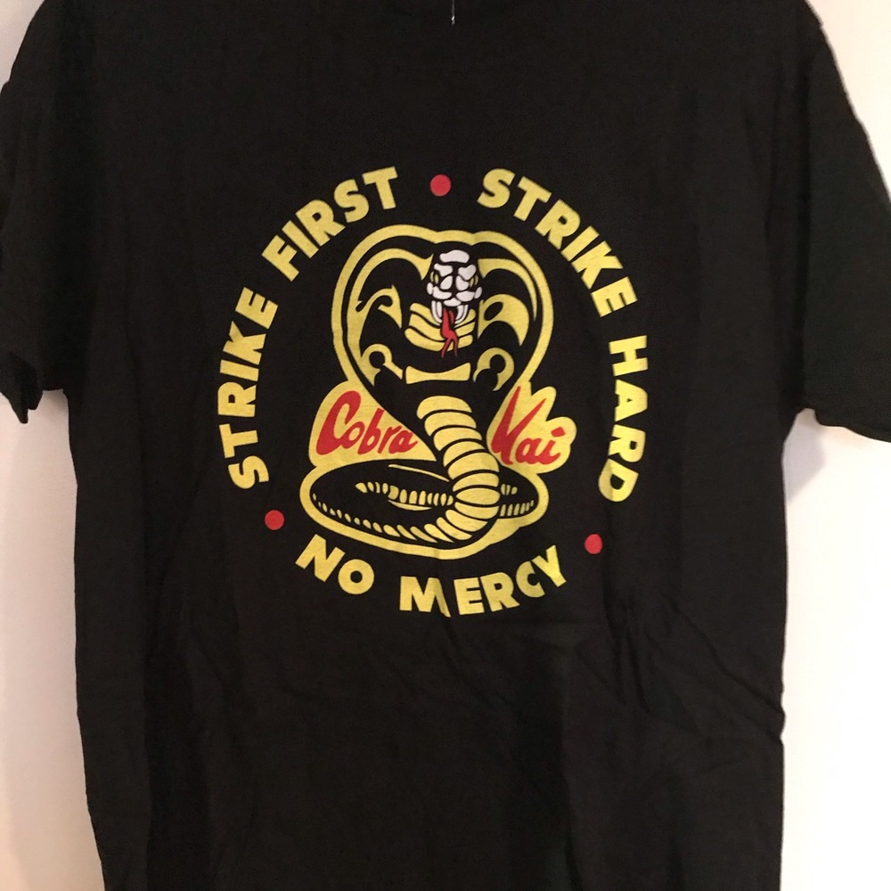 Cobra-Kai Strike First Shirt. Adult Medium